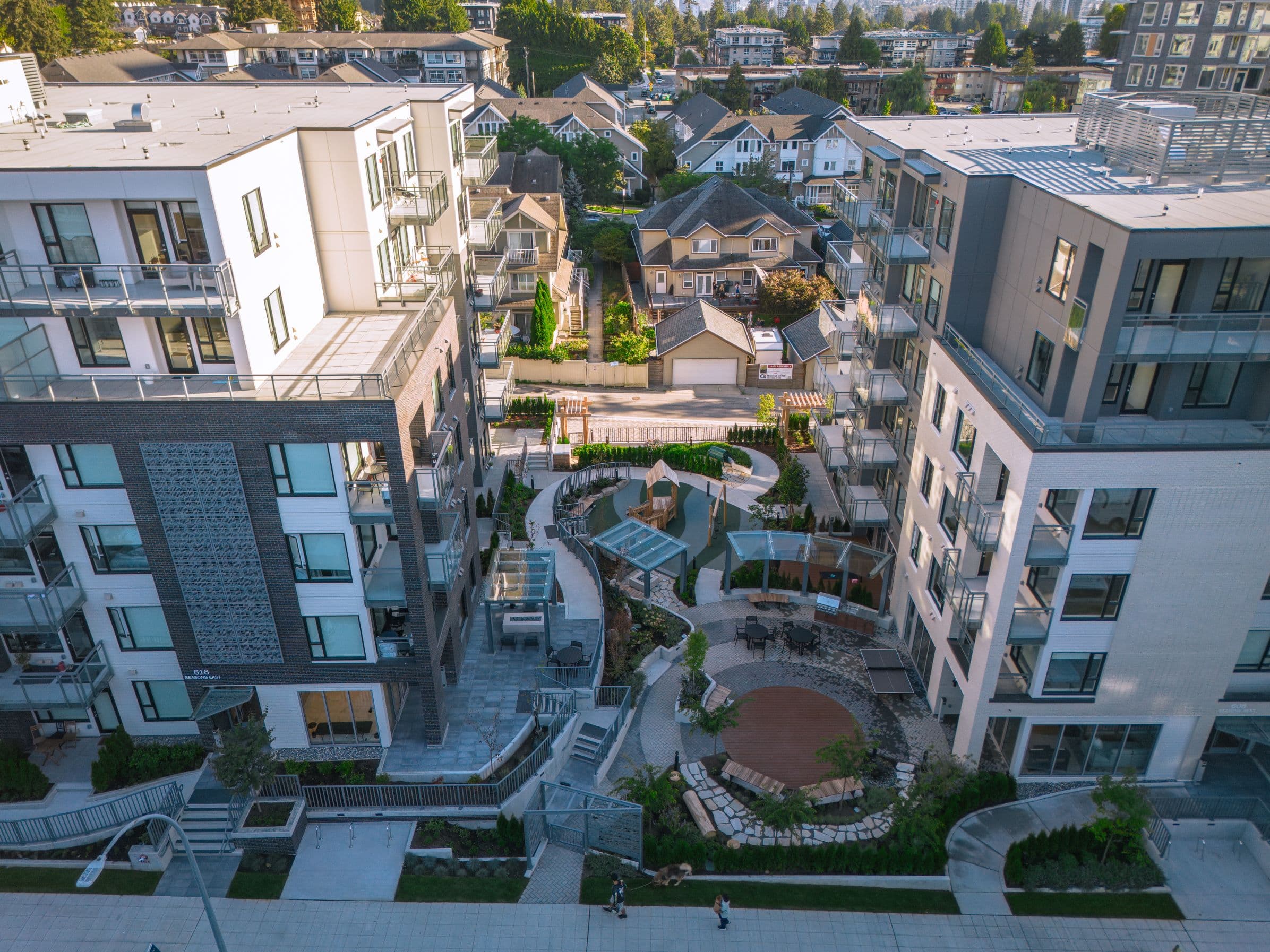 The Seasons rental buildings and landscaped courtyard in West Coquitlam